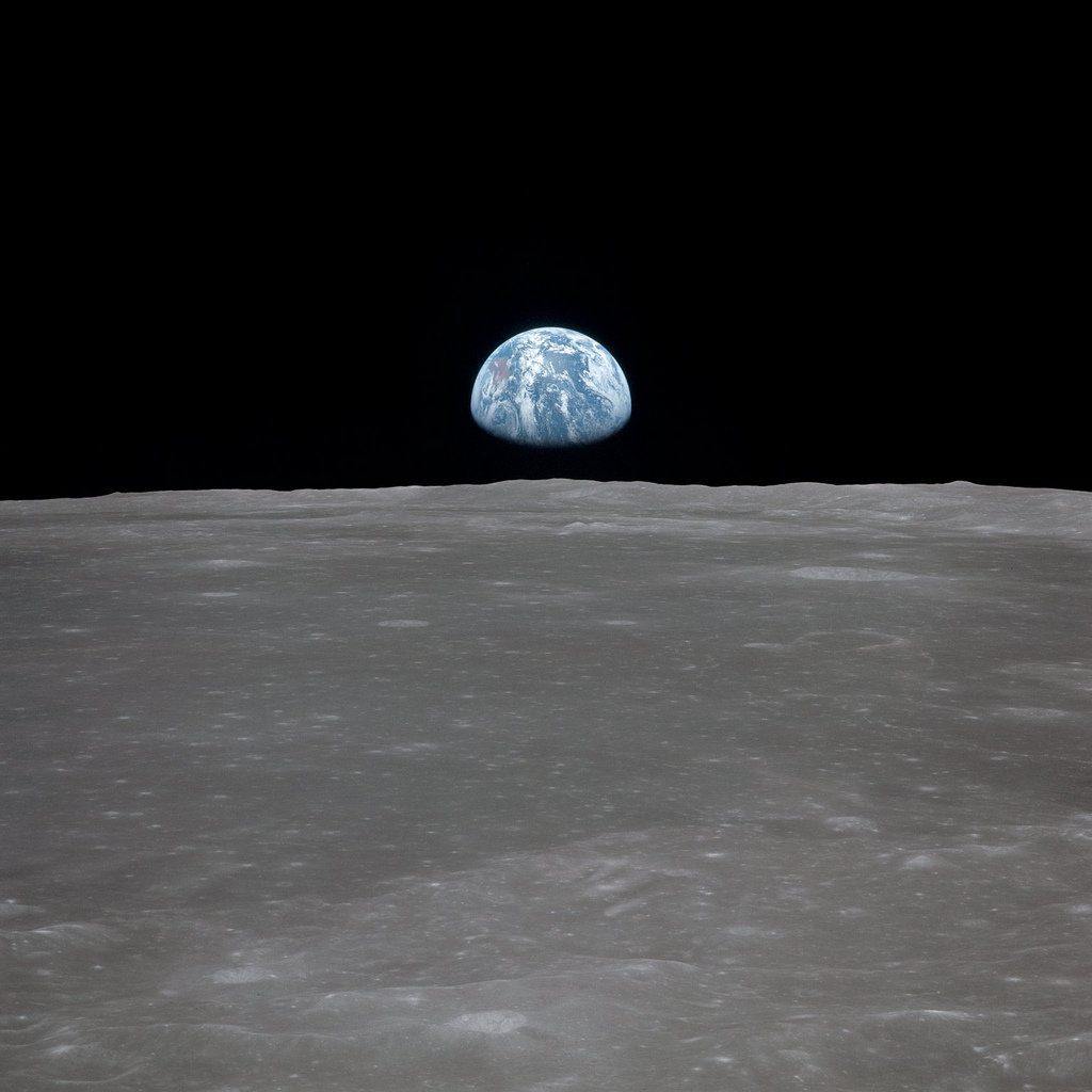 Earth rising over the moon
